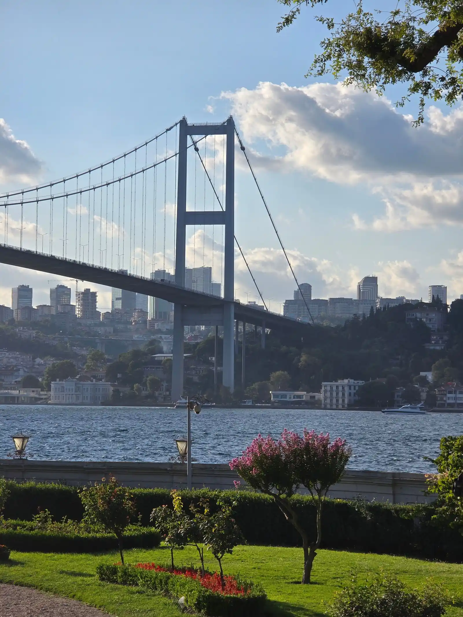Bosphorus suspension bridge and waterfront gardens in Istanbul
