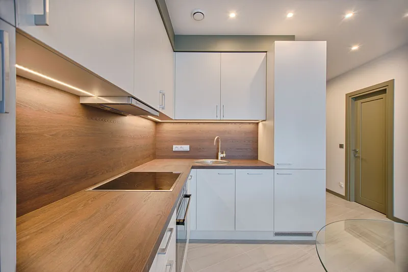 Illustrative stock image for an example listing: Kitchen and dining area of 3-Bedroom Apartment in Metrokent