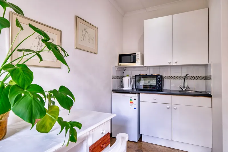 Illustrative stock image for an example listing: Kitchen and dining area of 2-Bedroom Apartment in Kocamustafapaşa